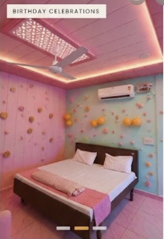 Birthday party room decorated with balloons
